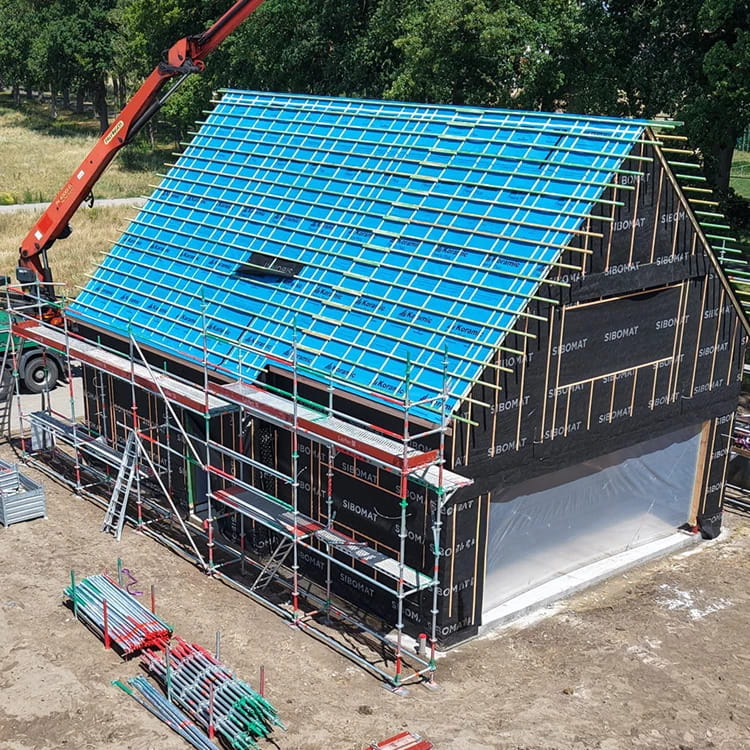 Chantier de construction à ossature bois Sibomat